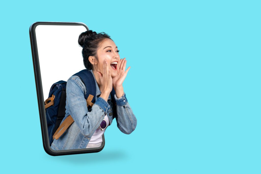 Smartphone pop up for advertising.Asian woman travel backpacker MARKETING - GEEKABITE WEBSITE DESIGN - GIRL SHOUTS THROUGH MOBILE SCREEN